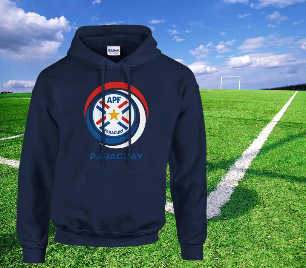Navy blue hoodie with Paraguayan sports league logo on a grassy field