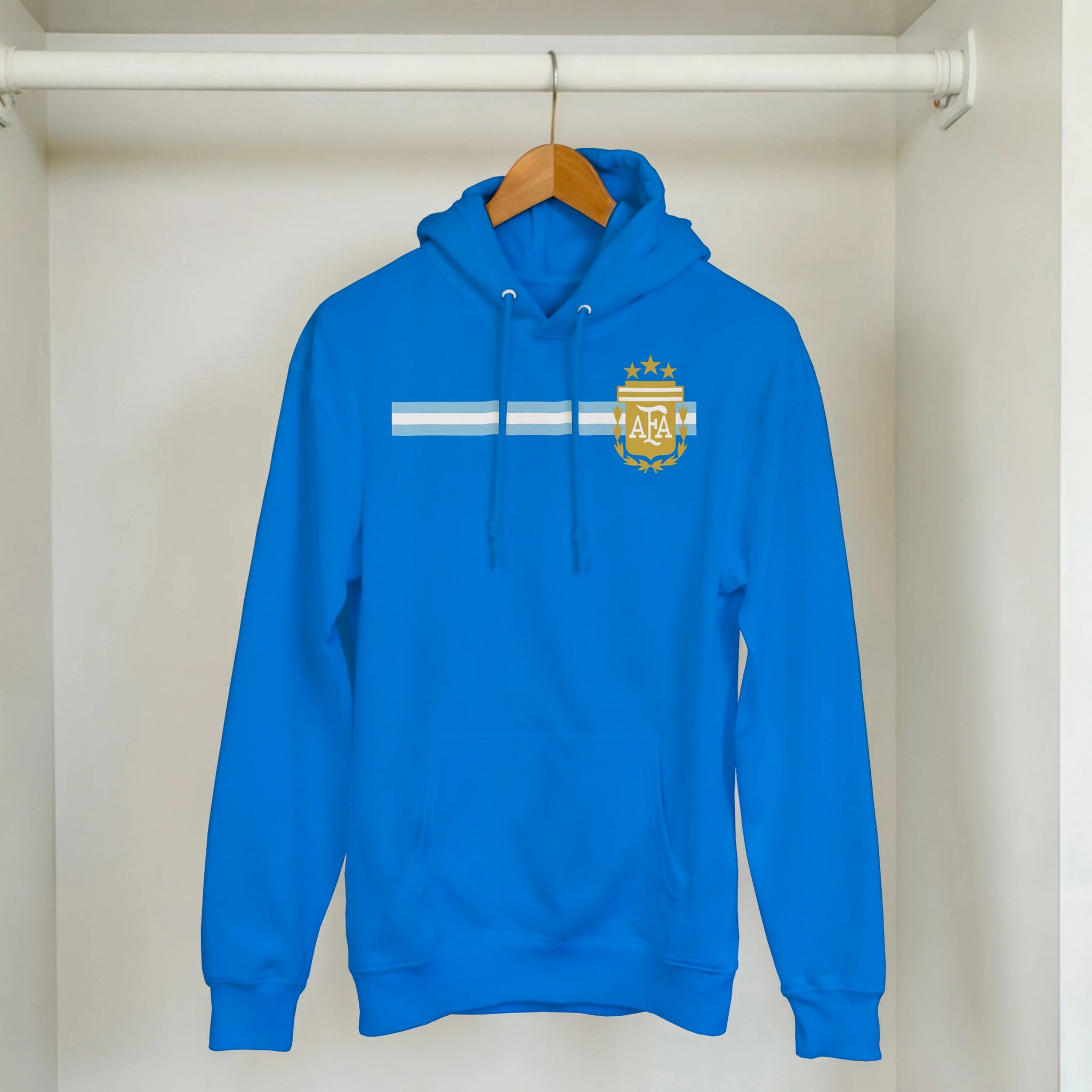 Blue hoodie with a logo and text on a hanger against a white background